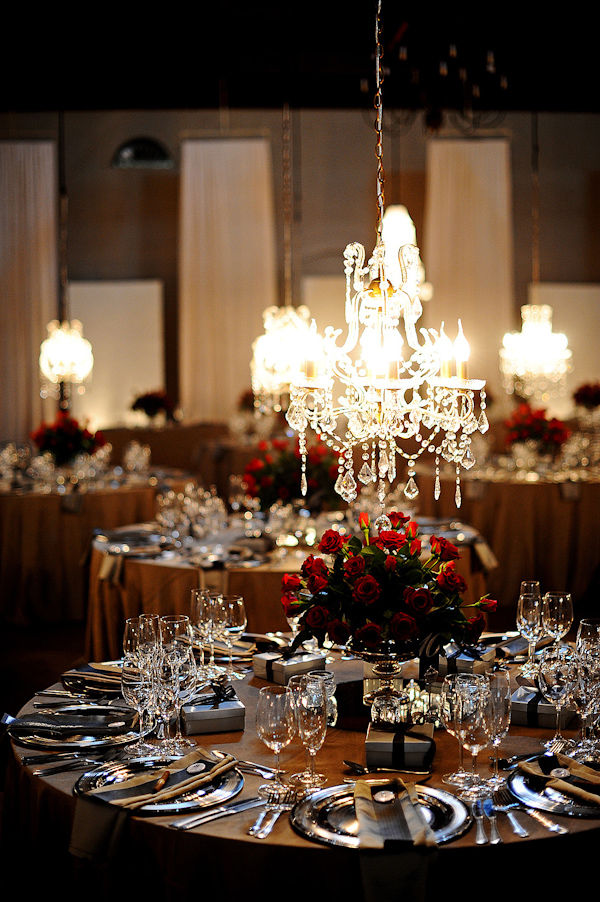wedding photo by Eric Uys Photography, reception, chandelier, tabletop detail 